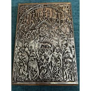 The image shows a metal scene from specifically the Assumption of Mary.